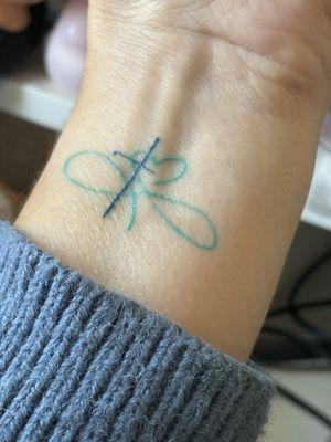 Evolve Body Art Delavan