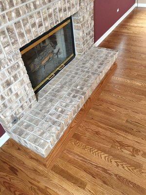 Framed out in front of fireplace