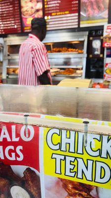 The guys behind the counter wear matching shirts. Way to be uniform. :-)