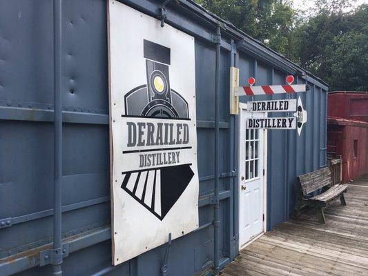 The shop is in a rail car sitting on rails