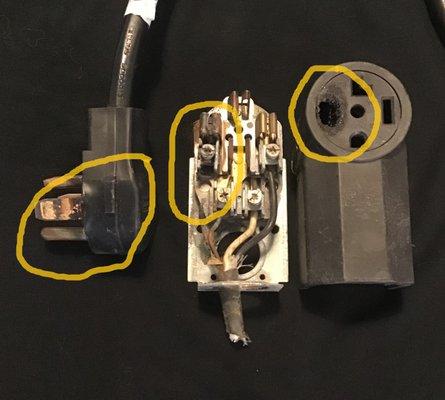Installer never tightened the left screw which caused the plug to melt over a period of time. Customer smelled fishy smell and called us.