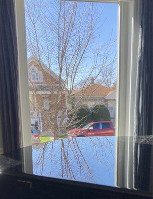 Looking out cleaned window is like looking through air.