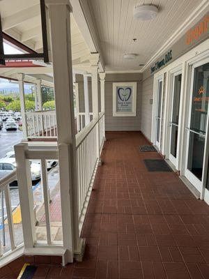 Blue sign above the door on the right.