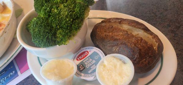 Baked potato, steamed broccoli with whipped butter and sour cream
