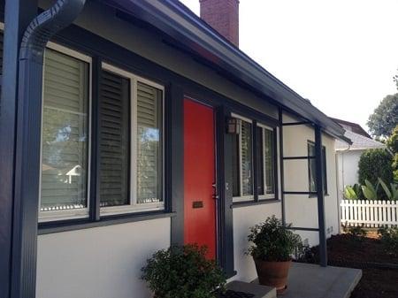 Dark trim over light body color makes a beautiful and dramatic statement on this Mar Vista home.