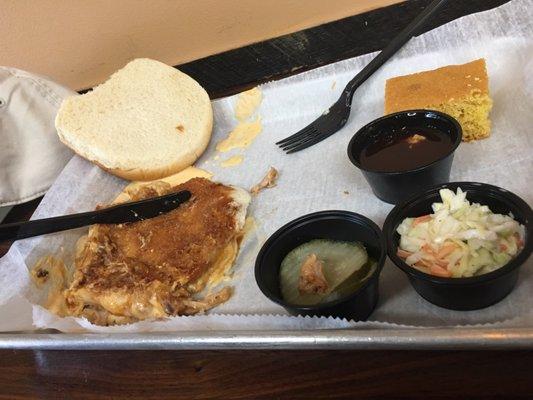 It WAS a pulled chicken with Queso sandwich, coleslaw, pickles and cornbread