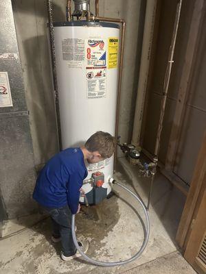 Bring your kid to work day! Helping drain the water heater