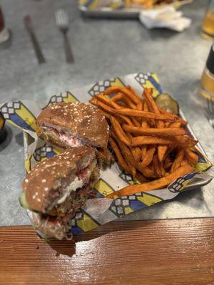 BYOB: veggie burger with goat cheese, raspberry habanero sauce, cucumber and sprouts.   Sweet Potato Fries