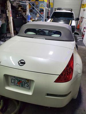 The 2007 350z we replaced the failing black top with this new medium gray- with no leaks!