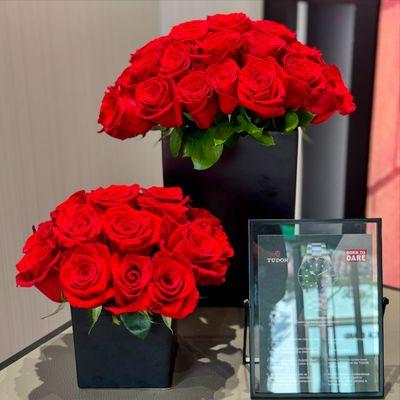 Contemporary red and black rose arrangements