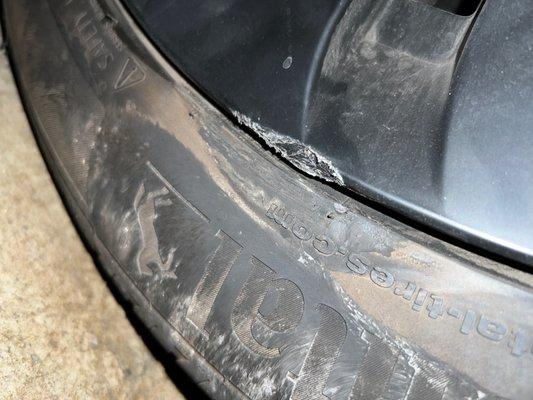 rear passenger tire and wheel damage