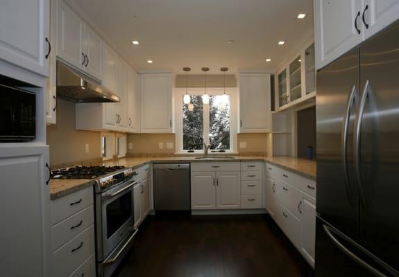 Recessed and under-cabinet LED lighting in a new kitchen remodel to meet California's Title 24 high efficiency lighting standard