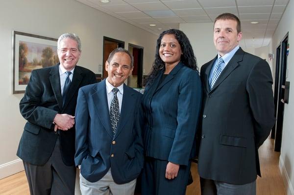 Our dedicated team (L-R): Dr. Ralph Bevivino, Dr. Louis Silvagnoli, Jr., Reena Zachariah, NP and Dr. Christopher Perkins.