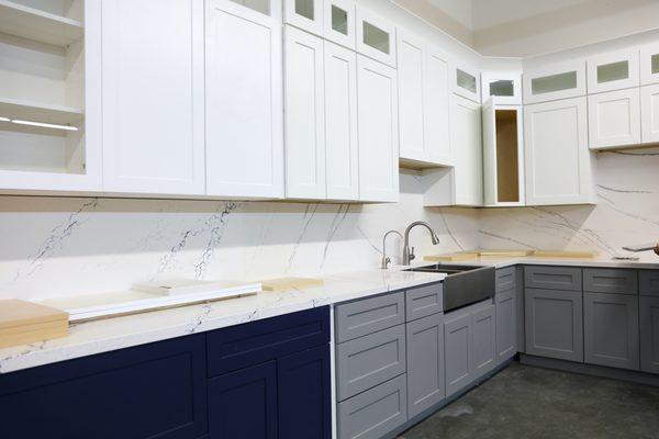American style cabinets of dark blue, white, and grey color