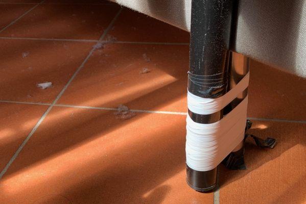 Dusty under there. Also the futon frames taped together.