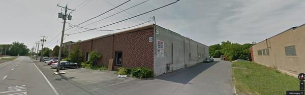 Enter driveway at 22 Railroad Ave, entrance in back of building.