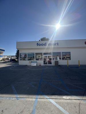 Pay inside - also has a mini convenient store inside with snacks & drinks