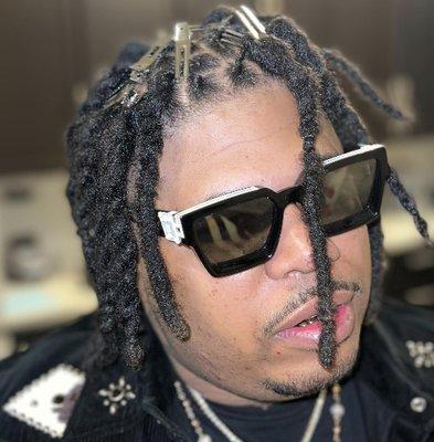 Braids, Loc Retwist, Silk Press, Sew Ins & More