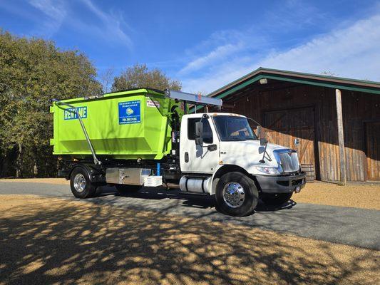 We use hook lift trucks that allow us to get into small spaces so we can place the dumpster in the best location for our customers.