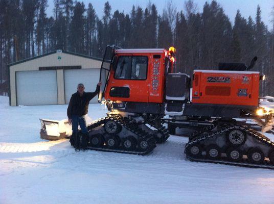 Snow cat ready to groom 300 miles of snowmobile trails with warming huts right from Albany, Wyoming