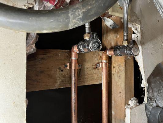 remove corroded and blocked galvanized pipe, install new copper pipe and valves
