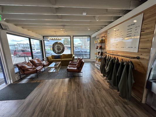 Comfortable seating area to the left of the entrance.