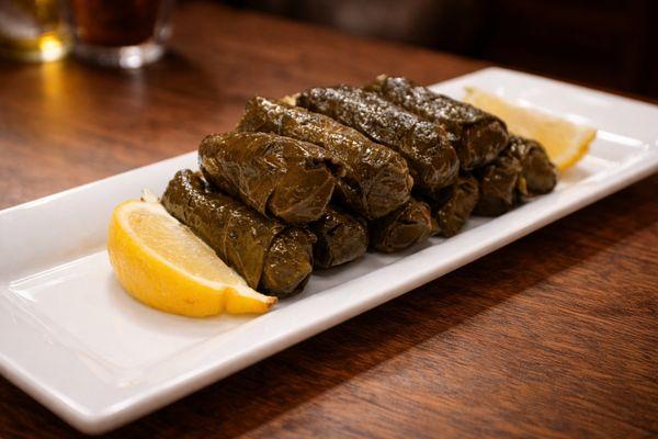 Dolmades - rice and jalapenó stuffed vine leaves
