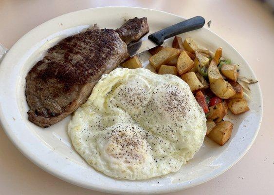 Top sirloin and eggs with home fries yum!