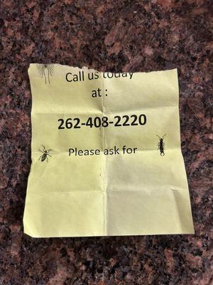 A "business card" that was stuffed behind a security camera on my deck.
