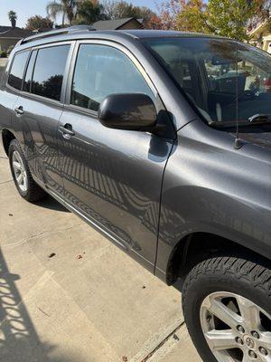 My 2009 Toyota Highlander and the brand new paint job.