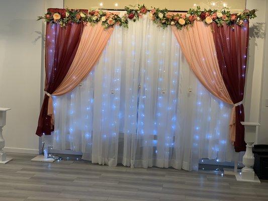 Backdrop on front wall of hall