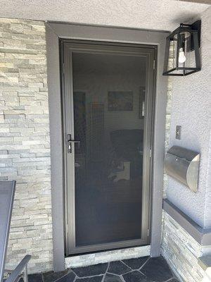 Custom recessed mounting. Foam moulding was not affected or modified. Crimsafe mesh security screen door with 3 point lock