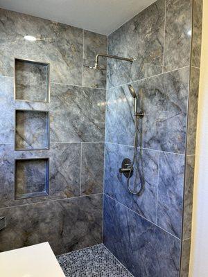 Bathroom remodel with large tile 3 of 3. Close up.