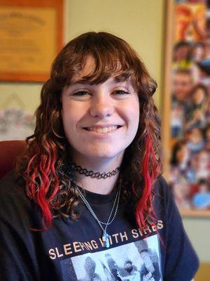 E. @ Tutoring By Toni