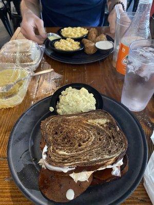 reuben sandwich with inedible potato salad. husband got wings and mac & cheese.