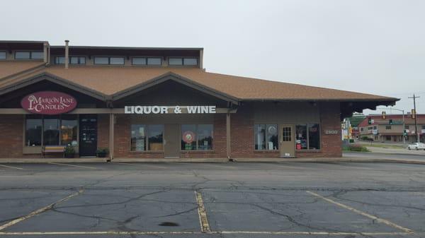 Looking at Brookwood liquor from the parking lot facing west.