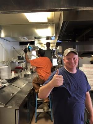 Justin with the crew on a commercial upgrade.