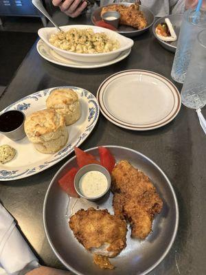 Chicken fingers with pickle ranch, compressed watermelon, buttermilk biscuits, and their mac & cheese.