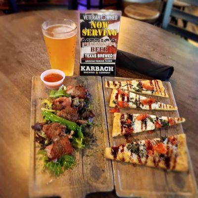 Bacon wrapped seasoned quail eggs and Margharita flatbread