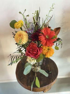 Beautiful Gerber daisies marigolds, dahlias, garden roses,