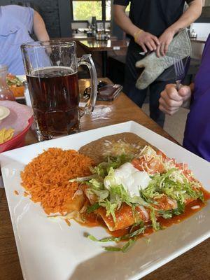 Supreme enchiladas on the lunch special. It's chicken enchiladas with rice and beans.