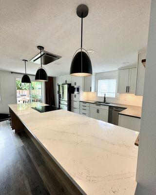 Quartz countertop kitchen island with range