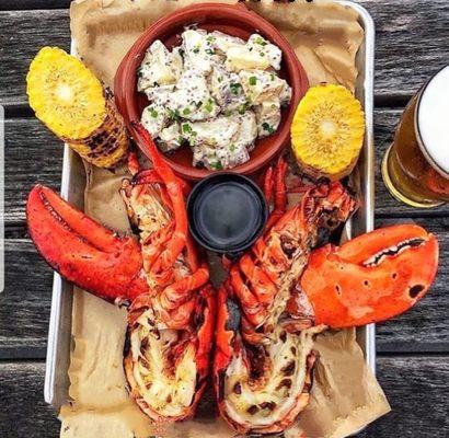 Grilled Maine Lobster with Black Truffle Butter, Lemon Kush Clarified Butter Corn on the Cob and Scottish Clotted Cream Potatoes with Dill