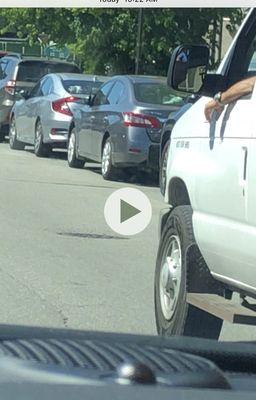 Driver smoking cigarette inside of the van