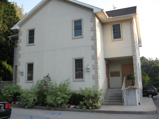 Across from the Mobil Station and the Car Wash at 153 Broadway (RTE 141) in Hawthorne, New York ( just off 9 A.