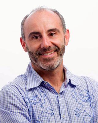 Alfonso Valenzuela - Gumucio - Realty One Impact