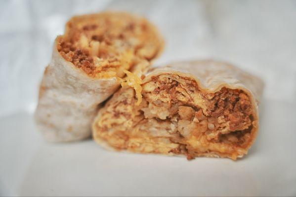 Chorizo Burrito. Spicy chorizo, scrambled eggs, and melty cheese. Each bite is deliciously comforting.