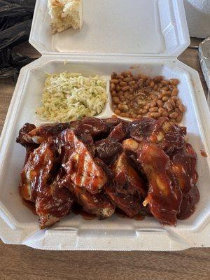 Large rib tip plate with baked beans and Cole slaw.
