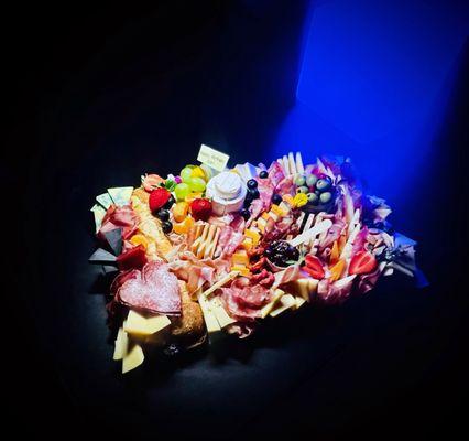 The beautiful board even came with extra bread, crackers in a nice basket, and a map of the cheeses.