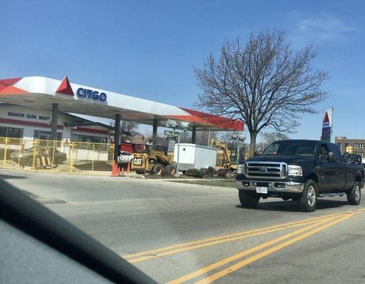 Construction happening, can't pump gas, price sign still on